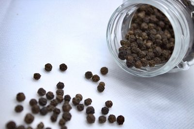 Whole black peppercorns